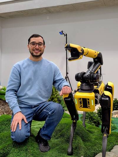 Posing with our Boston Dynamics Spot robot at 1:00AM on a weekend in FUSE Lab at Arlington, VA.
